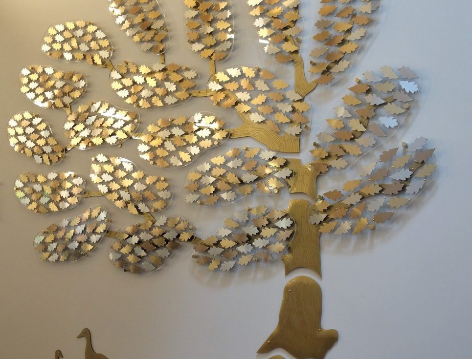 The Donor Tree wall sculpture, made from bronze, silver and gold leaves.