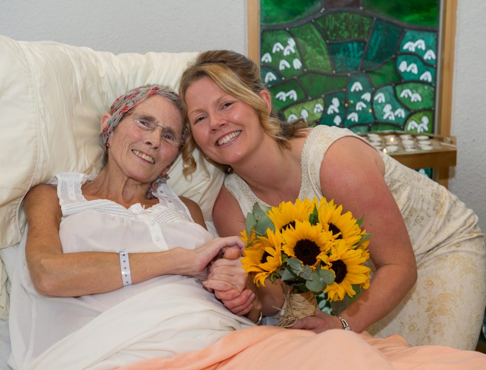 The wedding blessing for Abi Goddard and Kev McPherson in the scared space of St Richard's Hospice in Worcester.