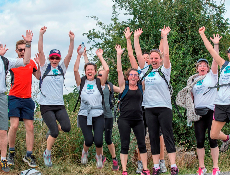 This button takes you to the fundraising events page. The button image shows a group of people wearing St Richard's Hospice t-shirts and walking clothes jumping in celebration.