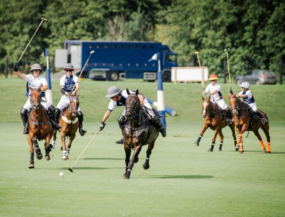 A polo match in action.
