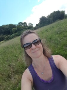 Fiona Tierney on a walk in a grassy field