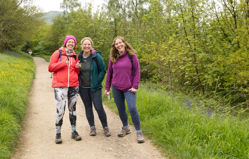 Three people taking part in the Malvern Hills Walk