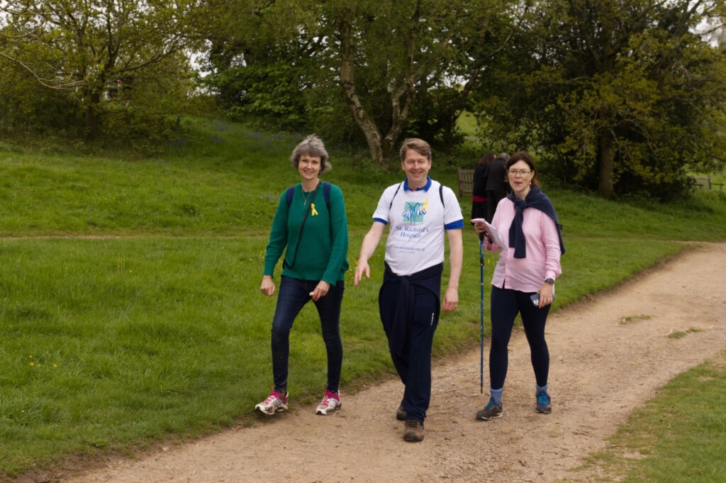 Three people taking part in the Malvern Hills Walk