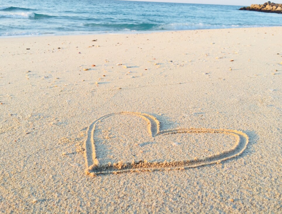 heart image drawn in sand